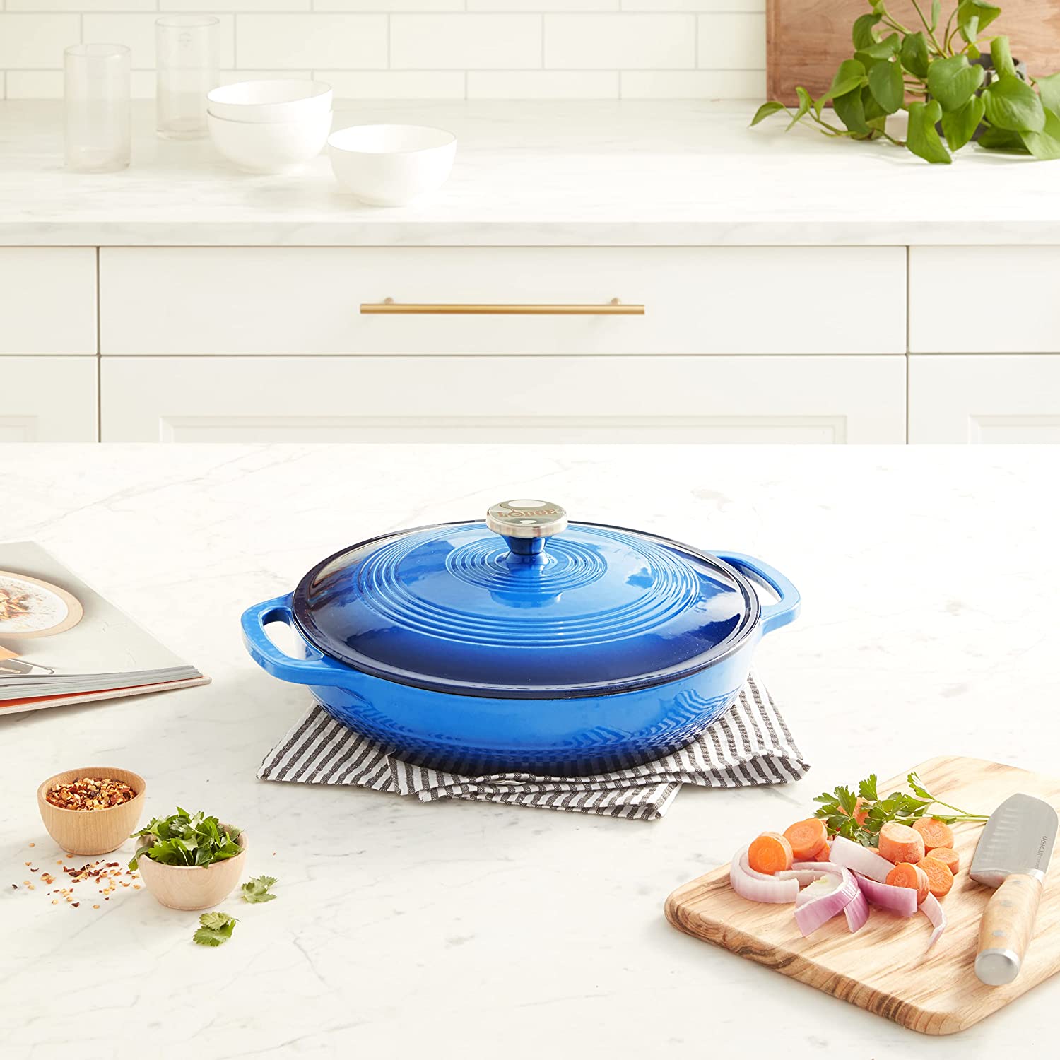 https://www.hatke.co.in/cdn/shop/products/lodge-cast-iron-36-quart-enameled-covered-casserole-pan-with-dual-handles-and-lid-caribbean-blue-276497.jpg?v=1703022183&width=1946